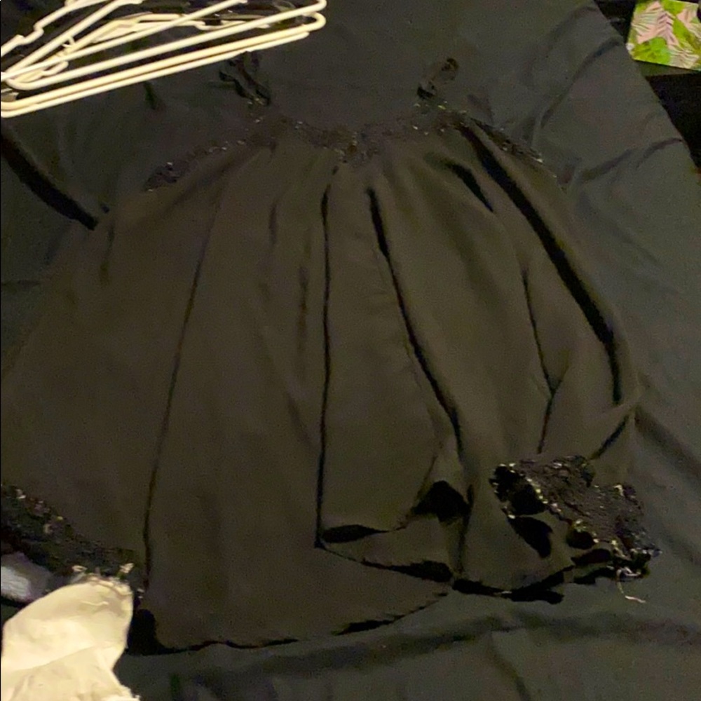 Flows black tank top